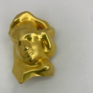 Gold Sisley Eau de Soir Face Sculpture Pin